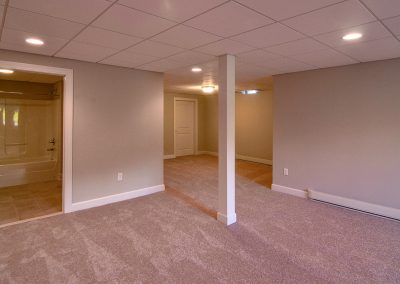 carpeted basement with bathroom