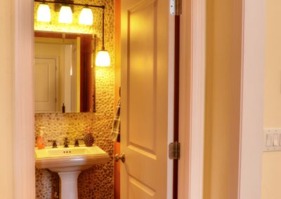 square pedestal sink in powder room