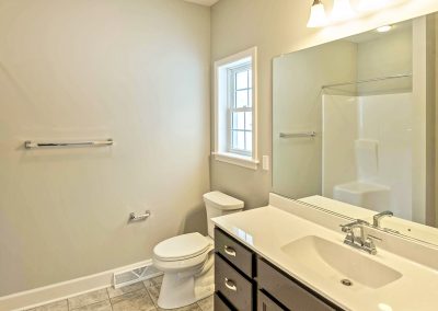 molded single vanity with mirror and shower