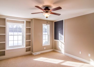 built in shelving in a bedroom