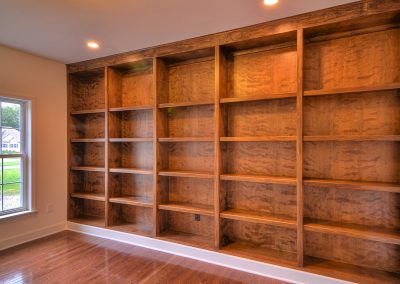 custom built in shelving in the study