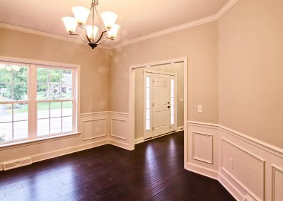 dining room with wall molding and crown molding