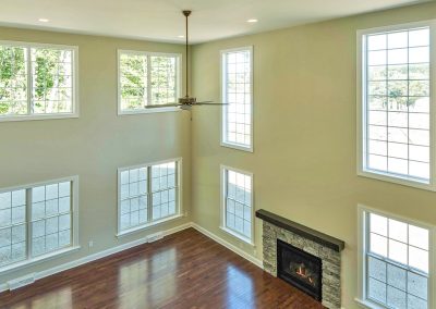 two story family rooms with lots of windows