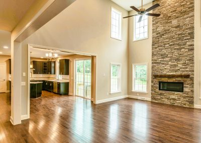 two story stone fireplace with custom fire box