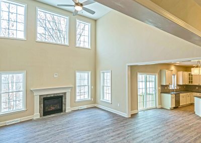 two story family room with hardwood