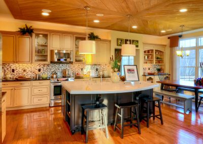large eat in kitchen with decorative wood ceiling