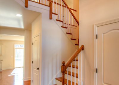 wooden staircase and railings