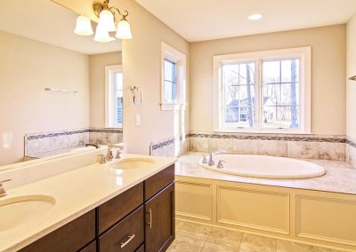 double bowl vanity and bath tub