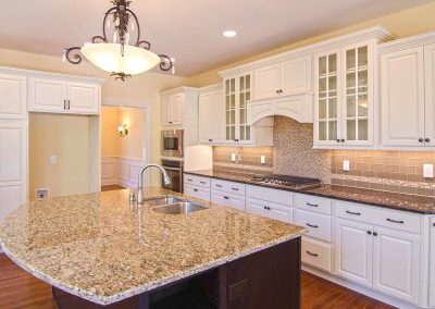 white cabinets with glass doors