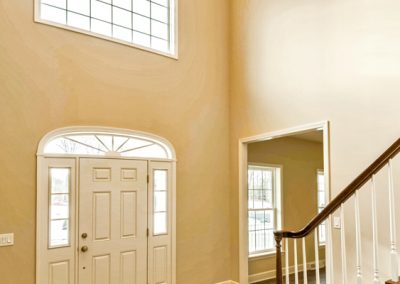 entry foyer with transom window